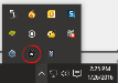 Windows Notification Area with Windows Scheduler icon circled